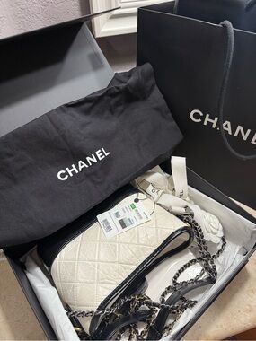 CHANEL Cream Quilted Leather Crossbody Bag with Black Trim